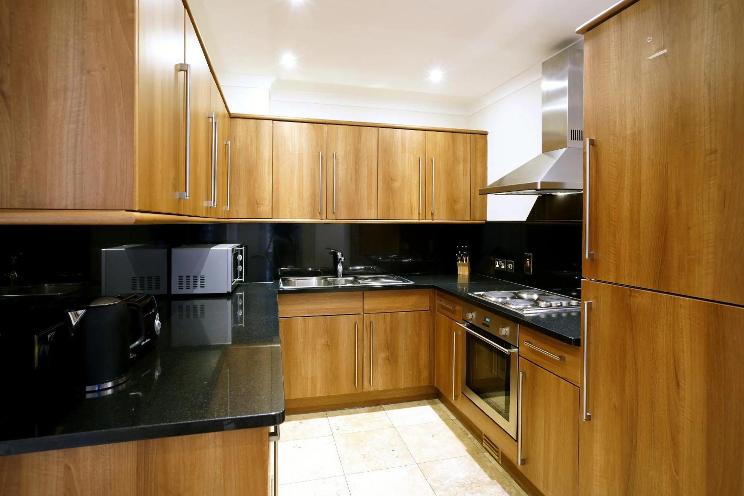 Kitchen or kitchenette in Queensgate Court