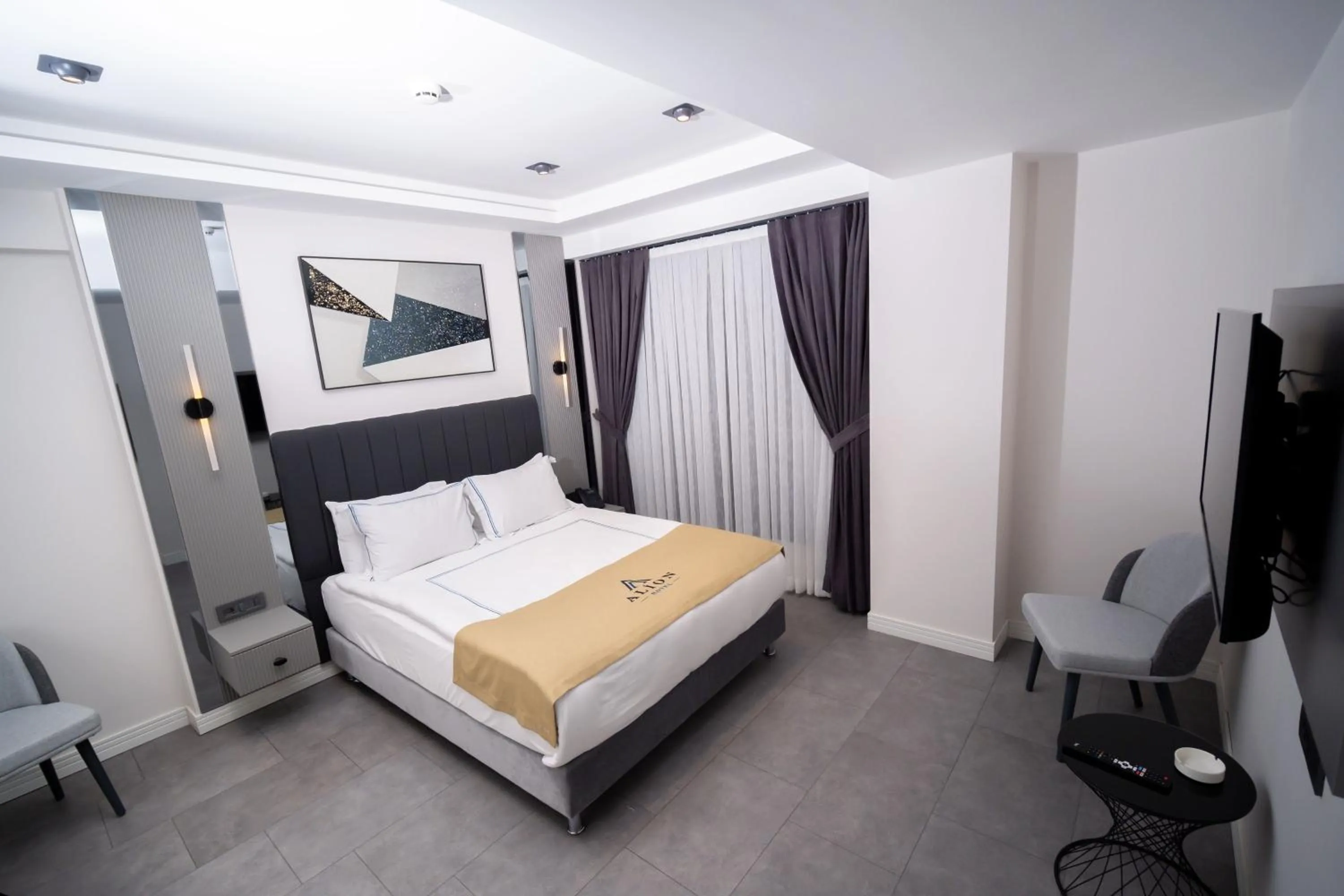 Bed in Alion Hotel