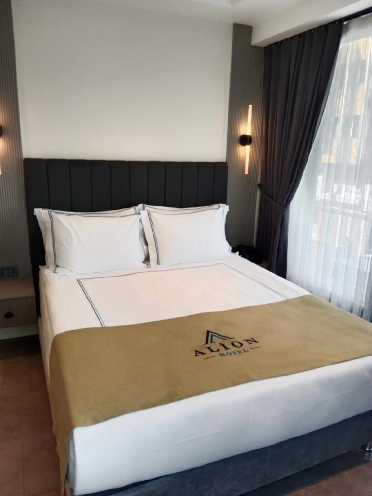 Bed in Alion Hotel