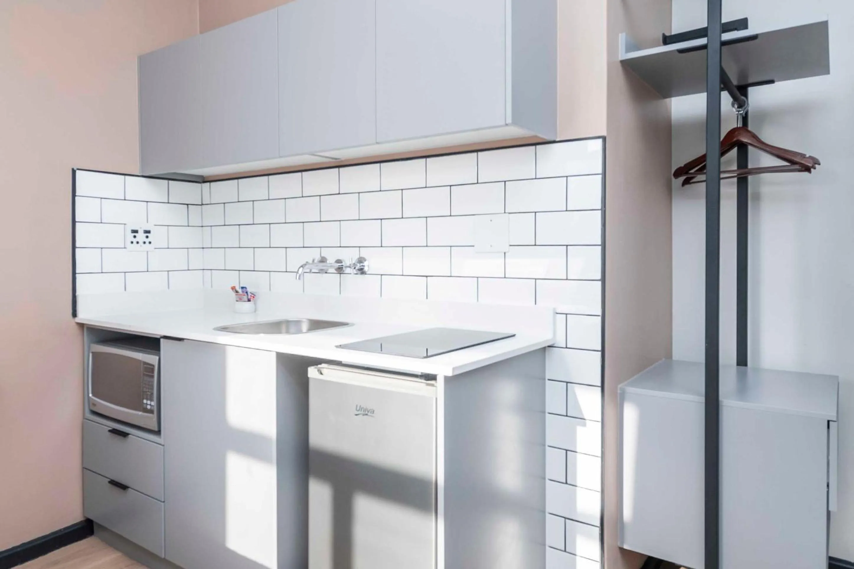 Kitchen or kitchenette in HAVN Aparthotel by Totalstay