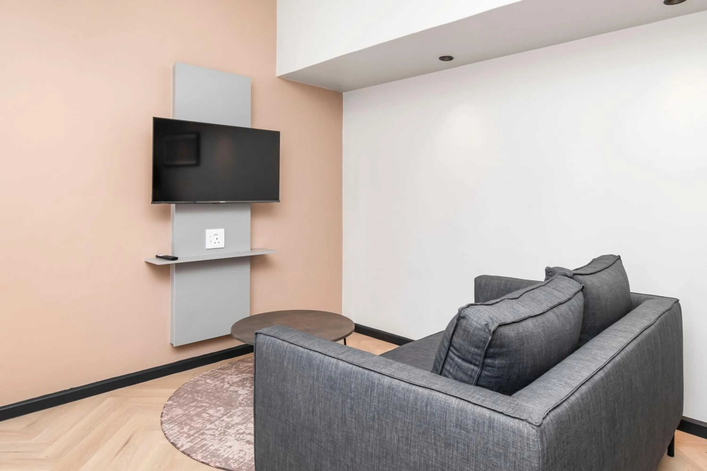 Seating area in HAVN Aparthotel by Totalstay