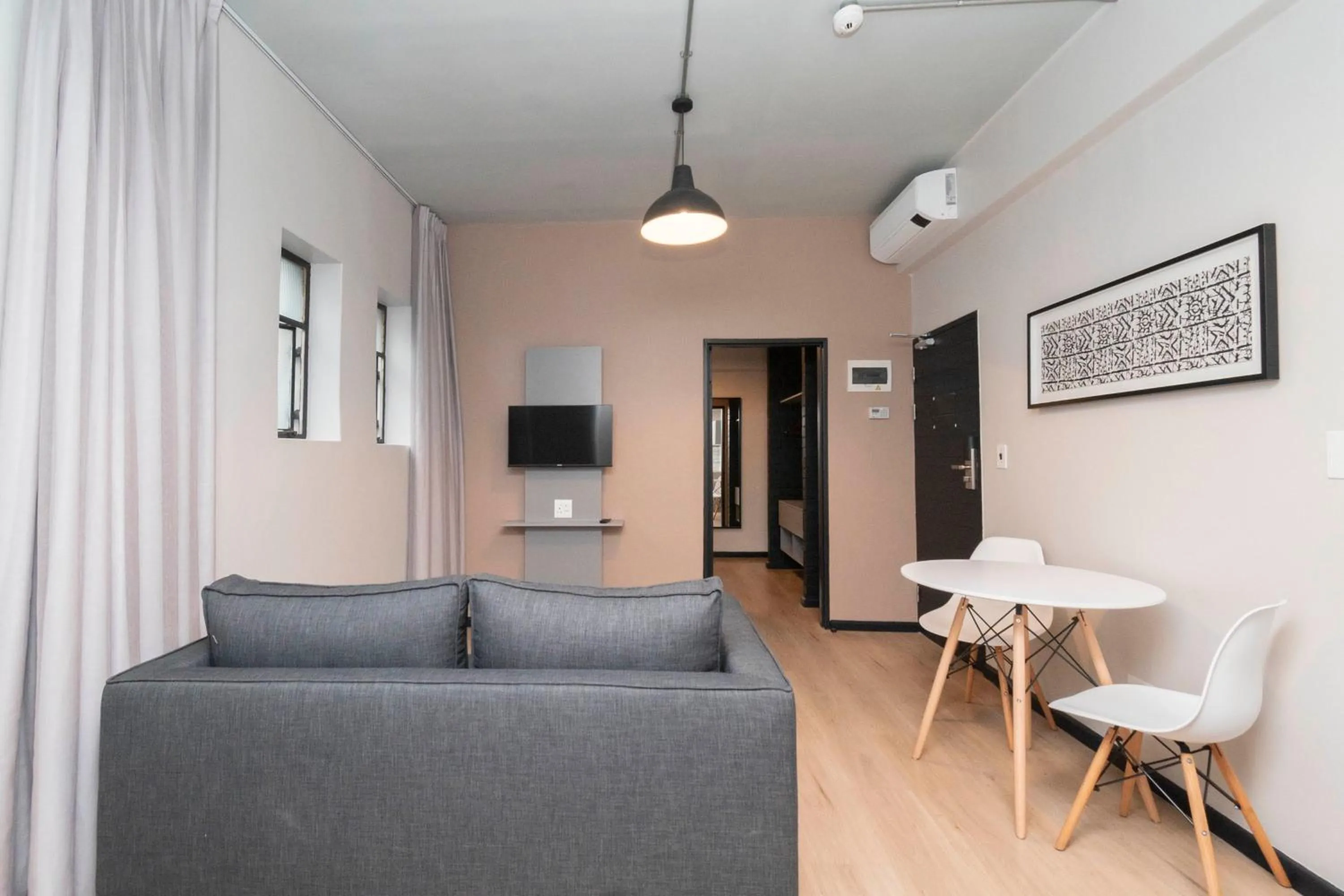 Living room in HAVN Aparthotel by Totalstay