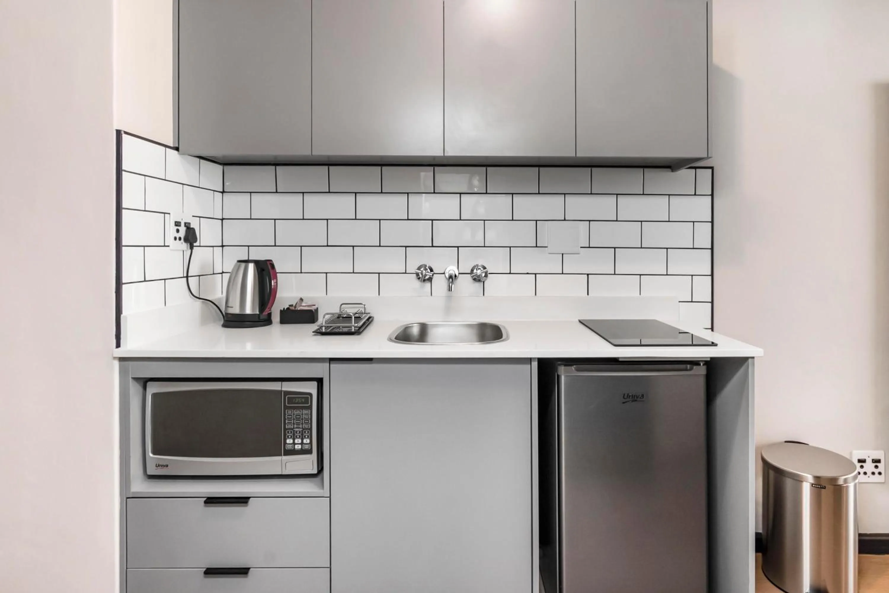 Kitchen or kitchenette in HAVN Aparthotel by Totalstay