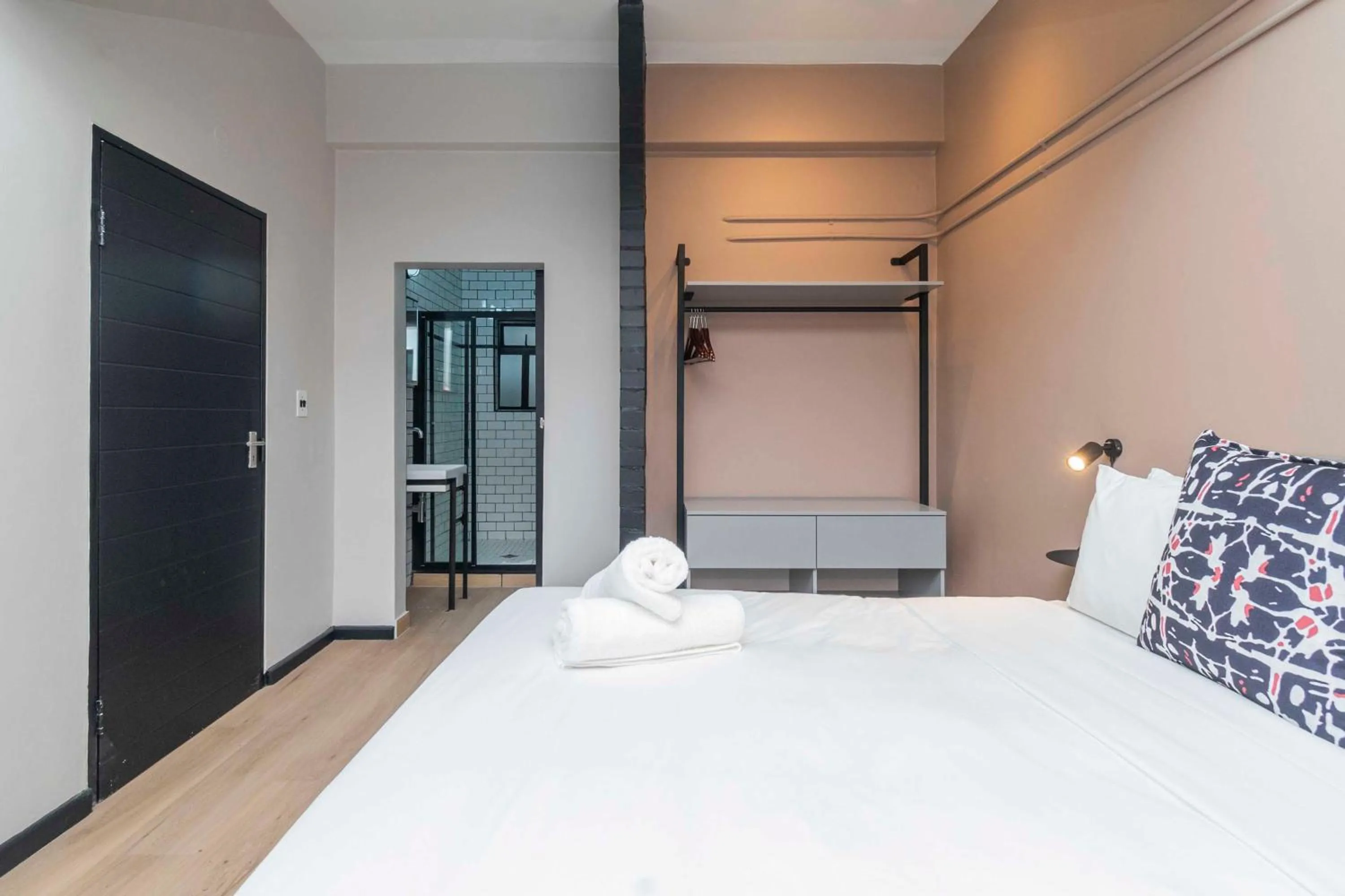 Bed in HAVN Aparthotel by Totalstay