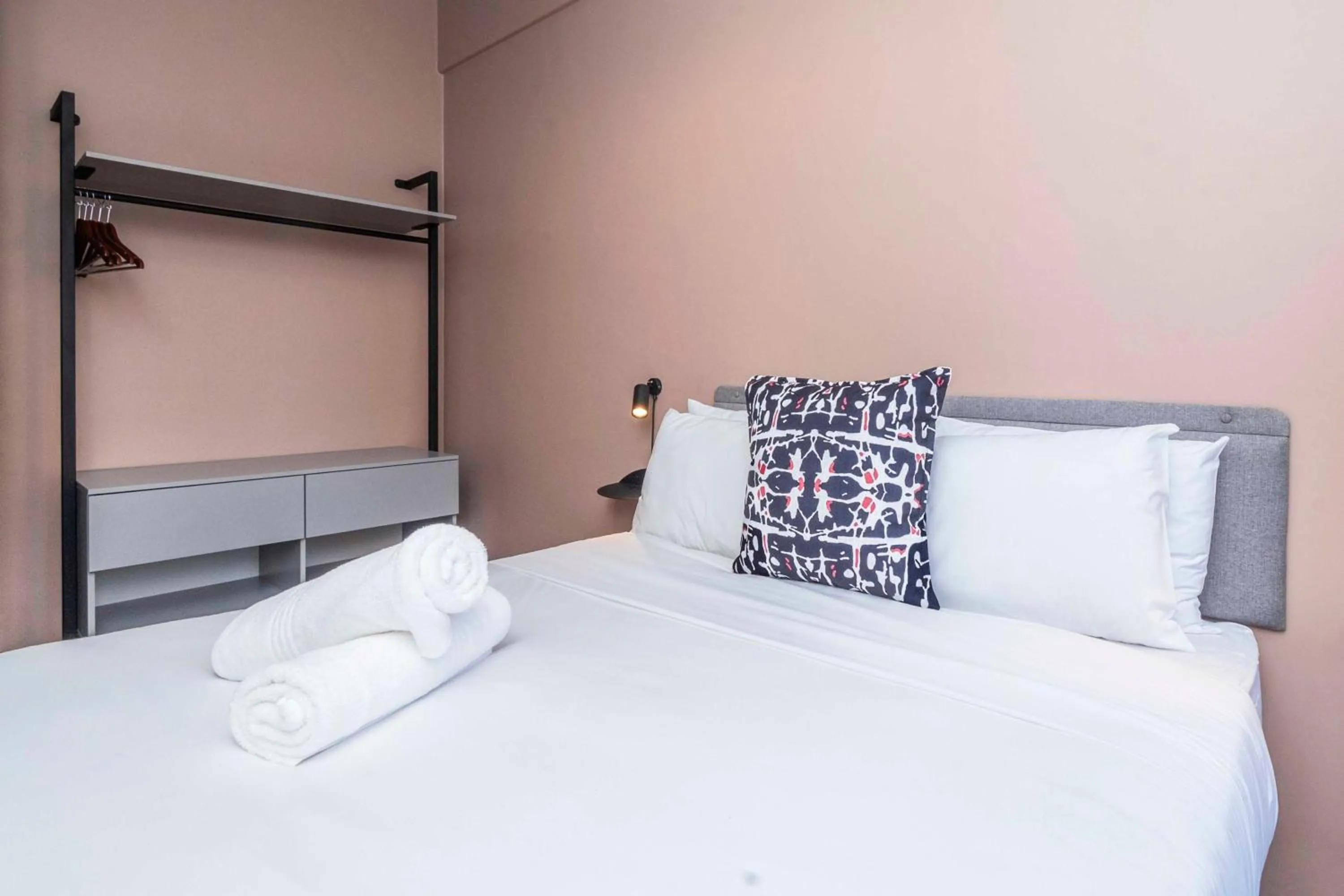 Bed in HAVN Aparthotel by Totalstay