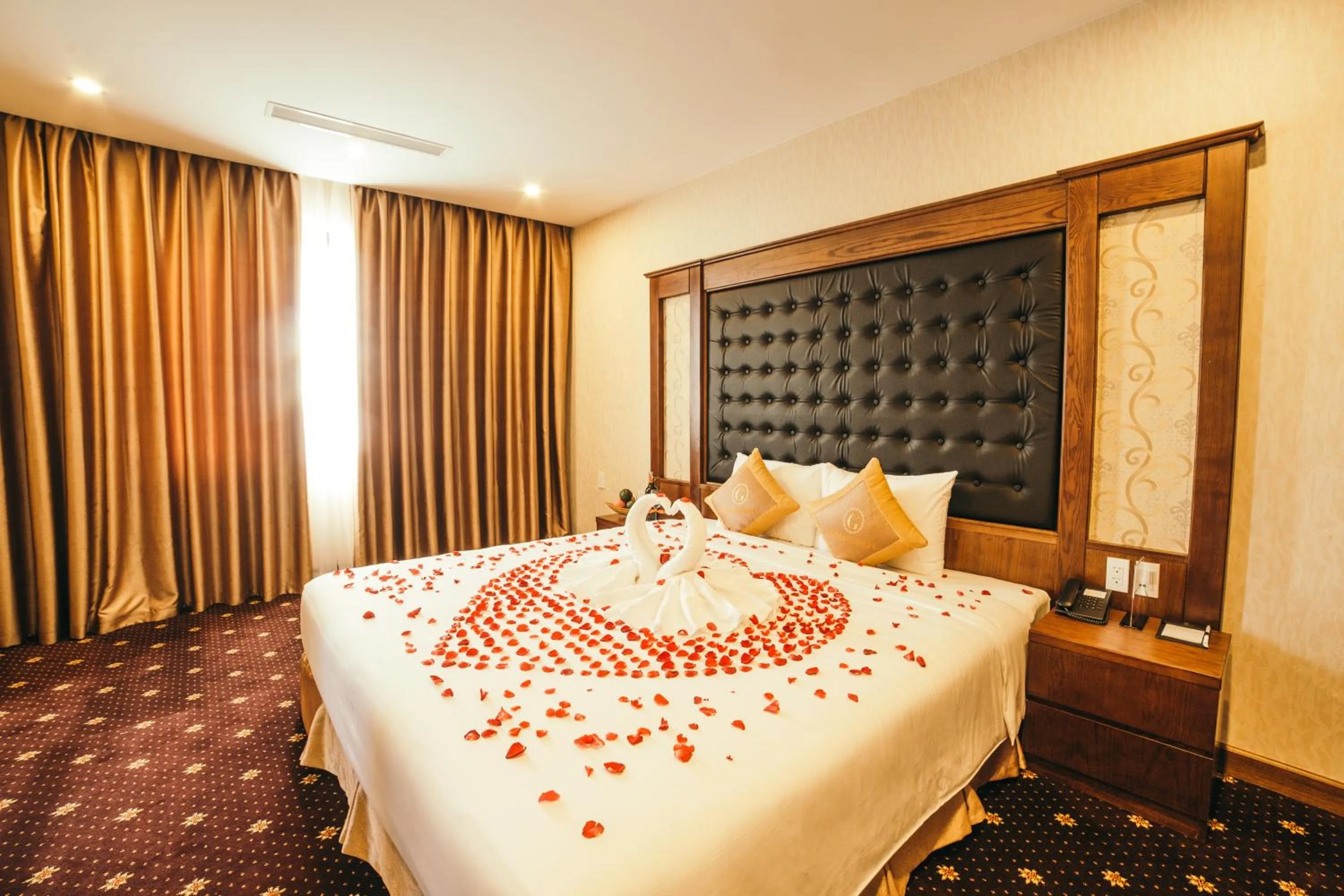 Bed in Grand Móng Cái Hotel