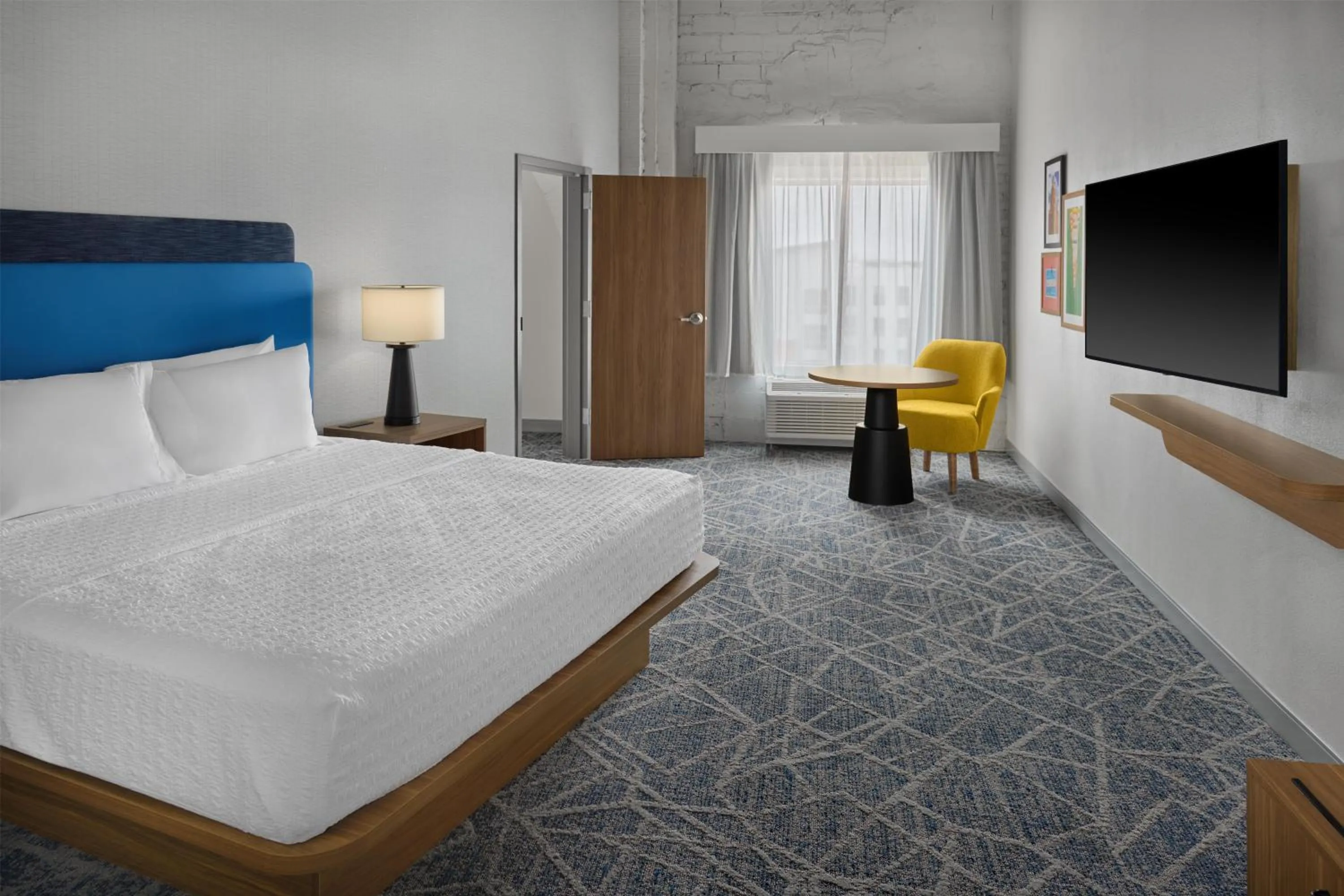 Bed in Hampton Inn by Hilton Lincoln Downtown