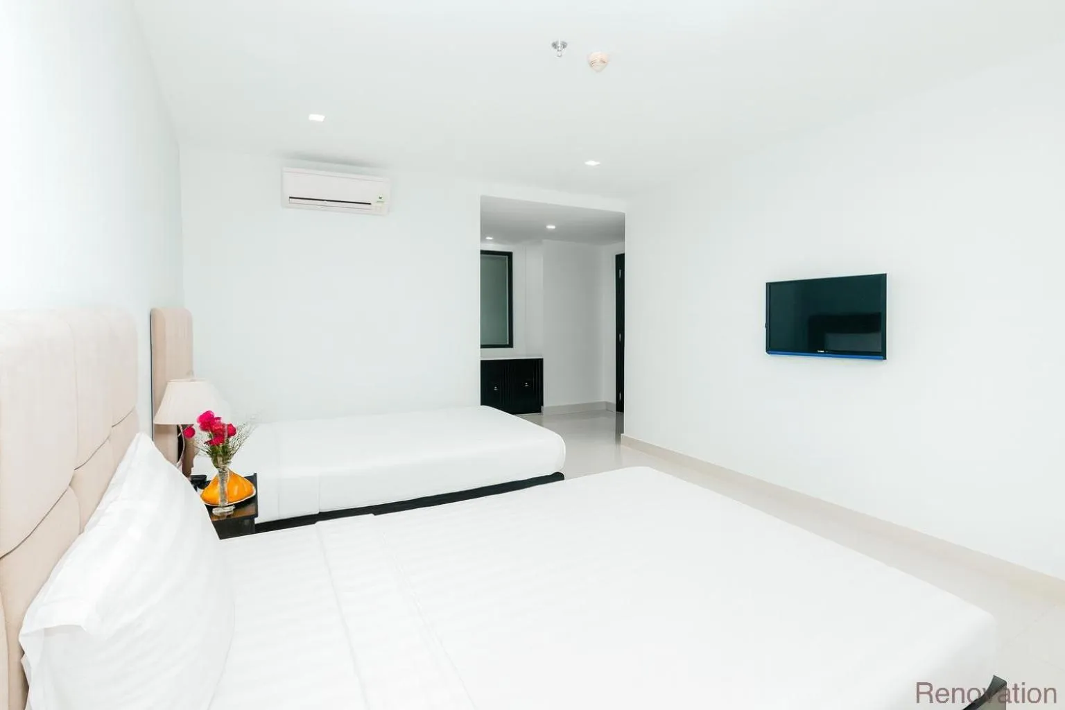 Bed in Ocean Haven Hotel