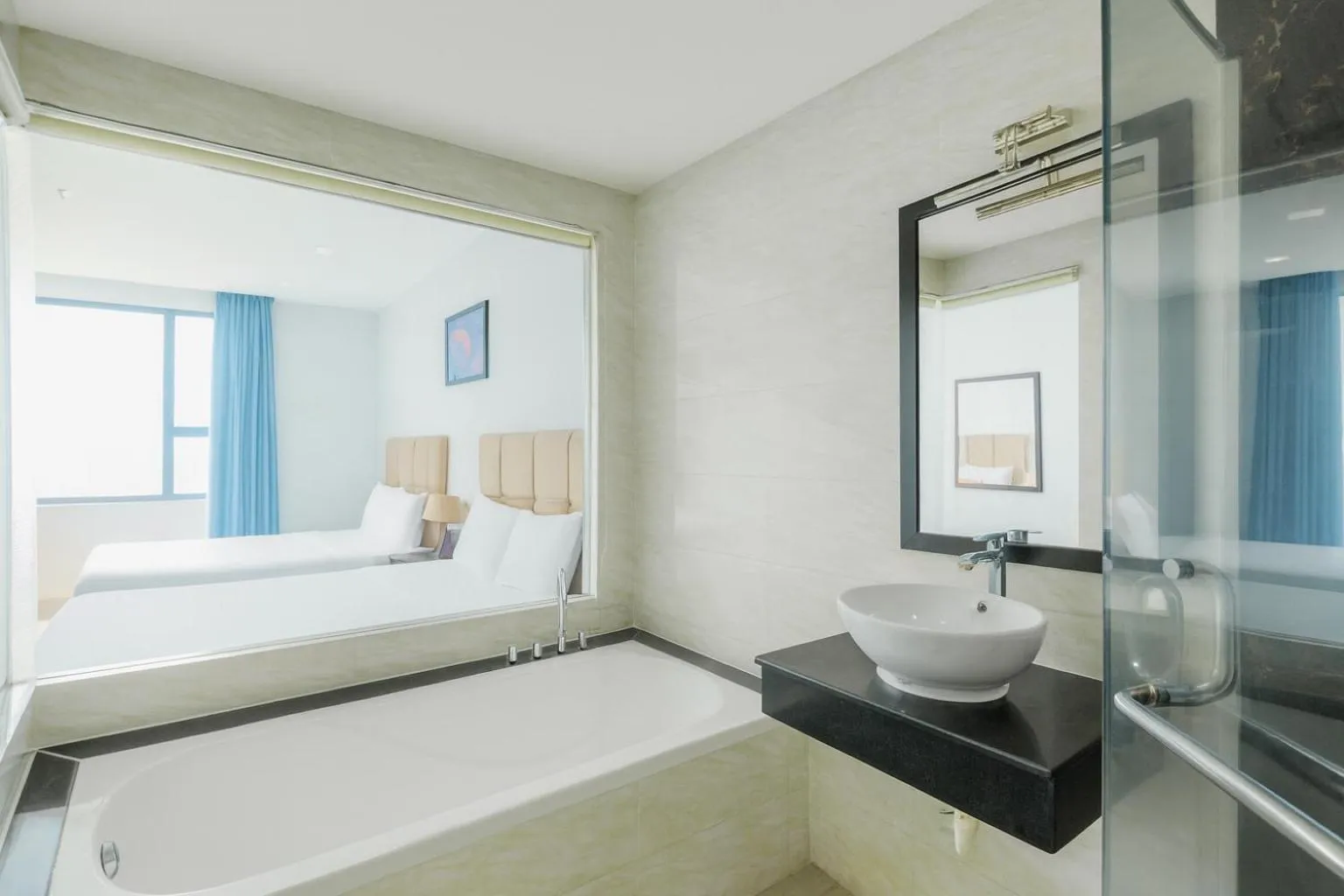 Bed in Ocean Haven Hotel