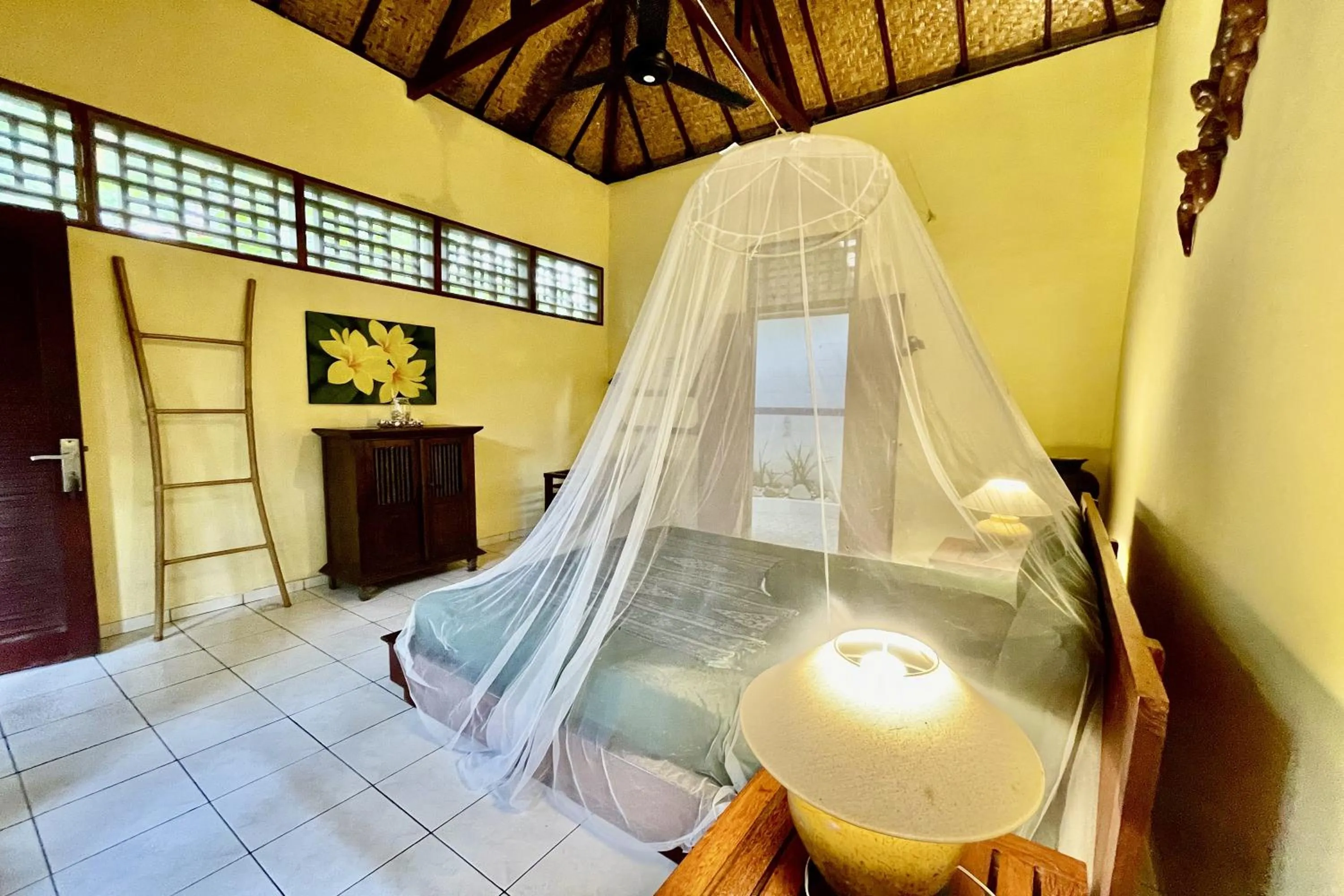 Bedroom in Raja's Bungalows