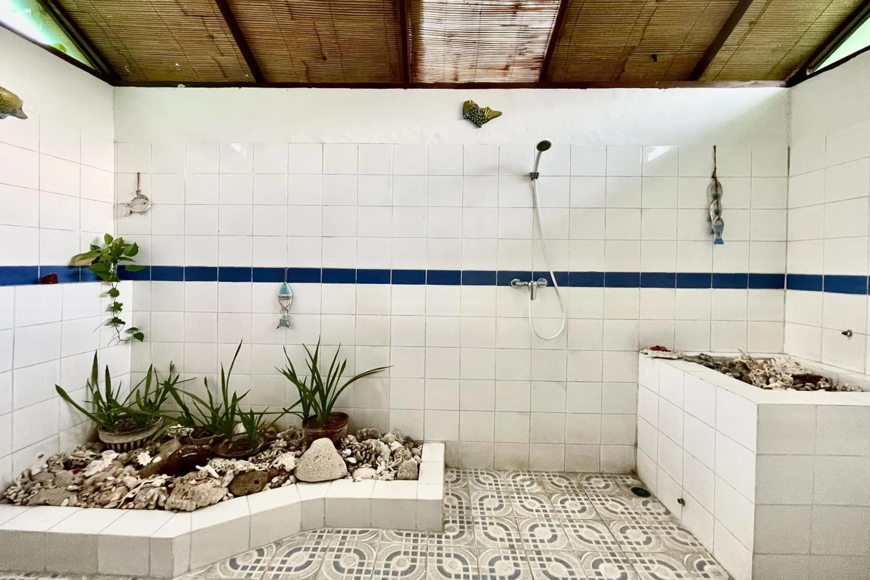 Bathroom in Raja's Bungalows