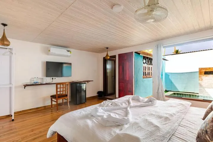 Bed in Sea Shades Cottages I Private Jacuzzi