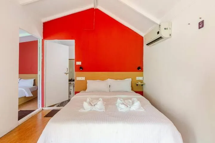 Bed in Sea Shades Cottages I Private Jacuzzi