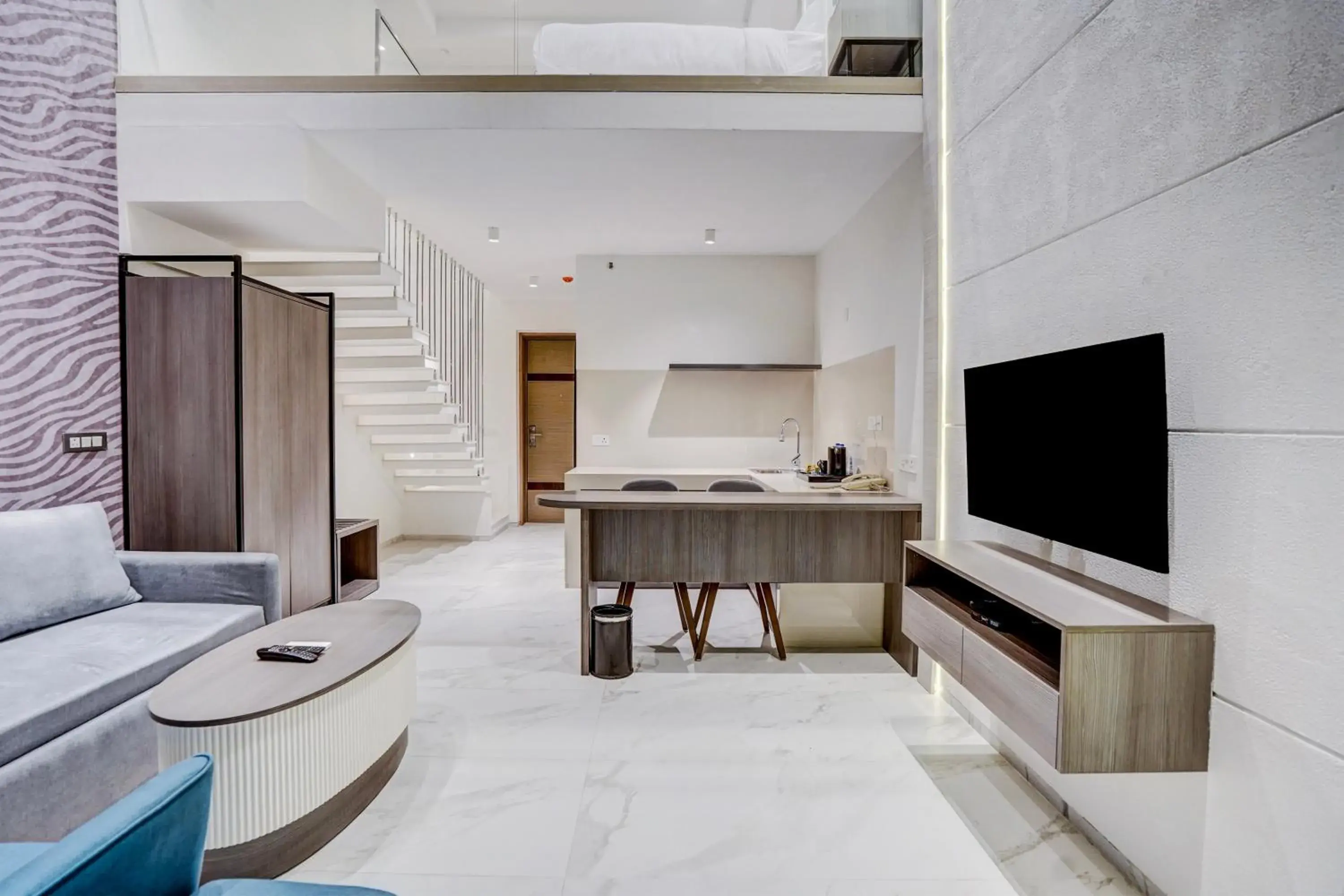 Duplex Premium Suite King Bed with Balcony in Sunday Hotel & Residences by CheckIn Gurugram Duplex Premium Suite King Bed with Balcony in Sunday Hotel & Residences by CheckIn Gurugram