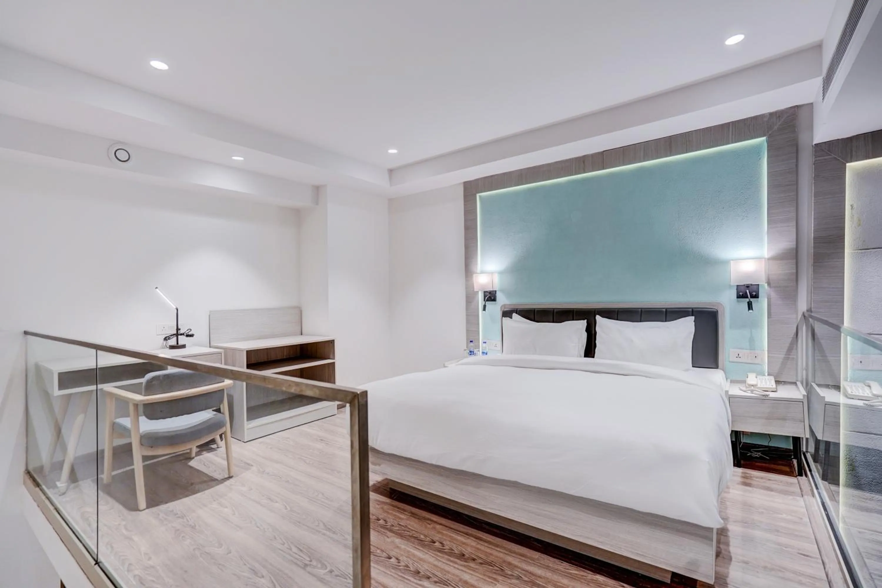 Bed in Sunday Hotel & Residences by CheckIn Gurugram