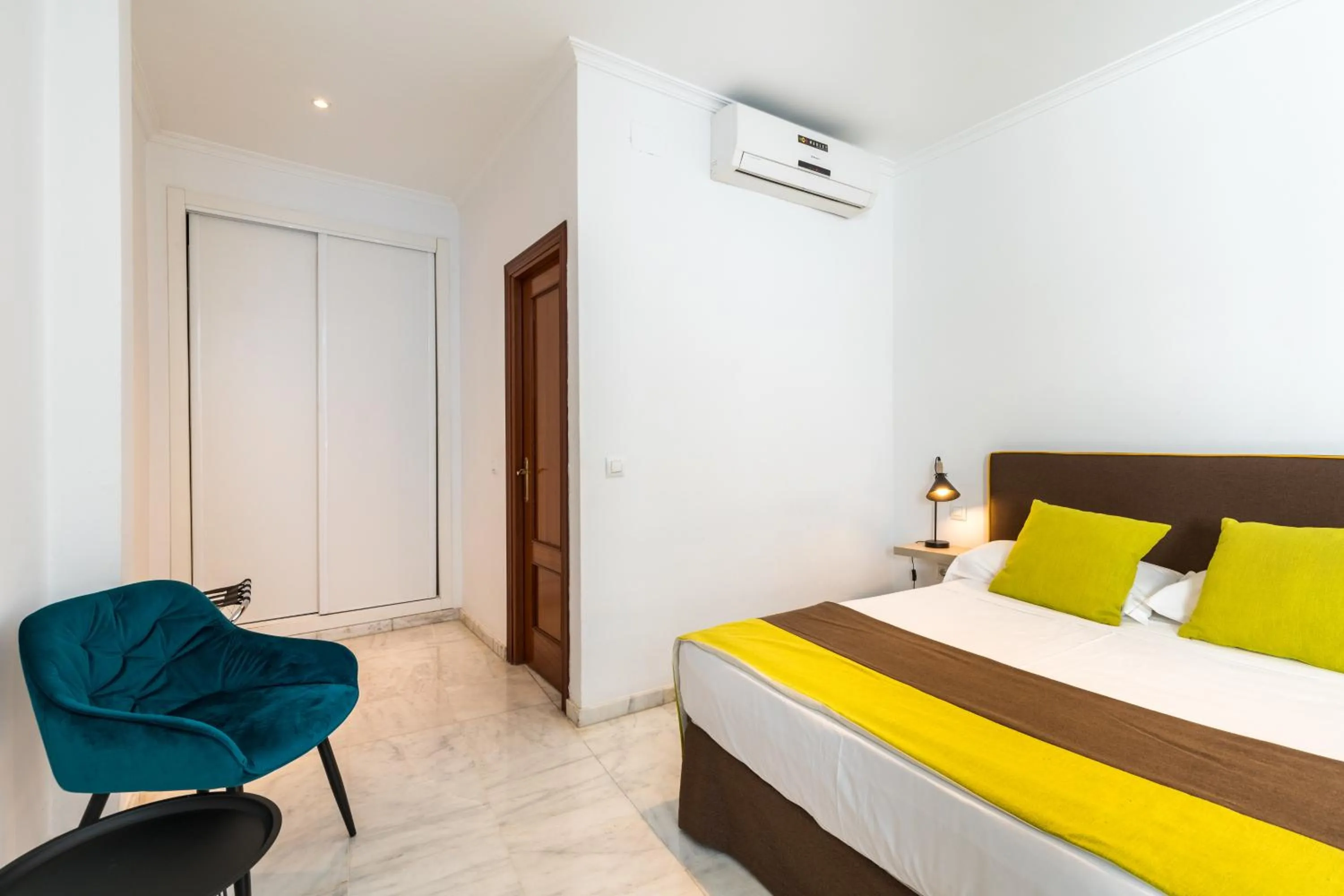 Bed in Cool Sevilla Hotel