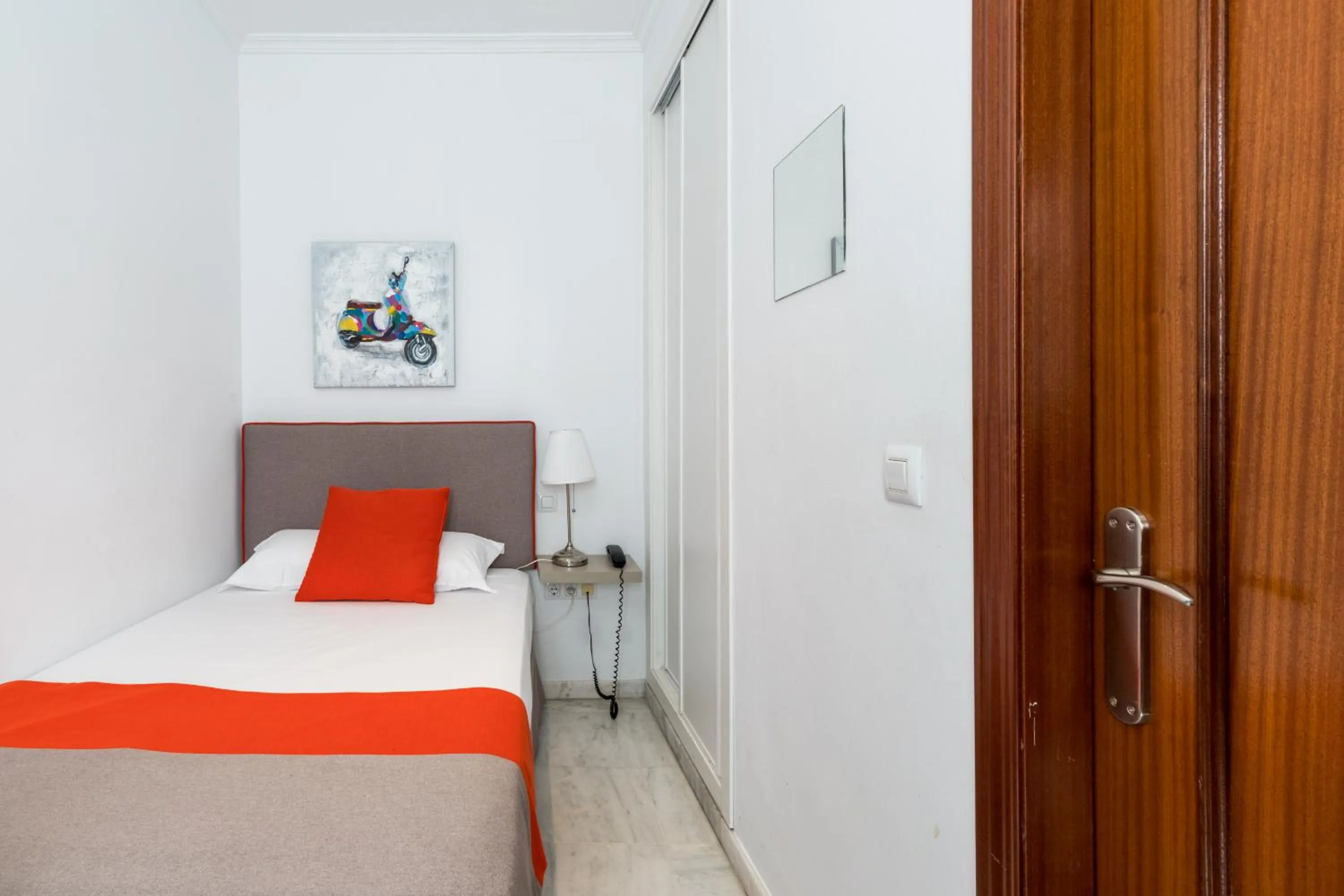 Bed in Cool Sevilla Hotel