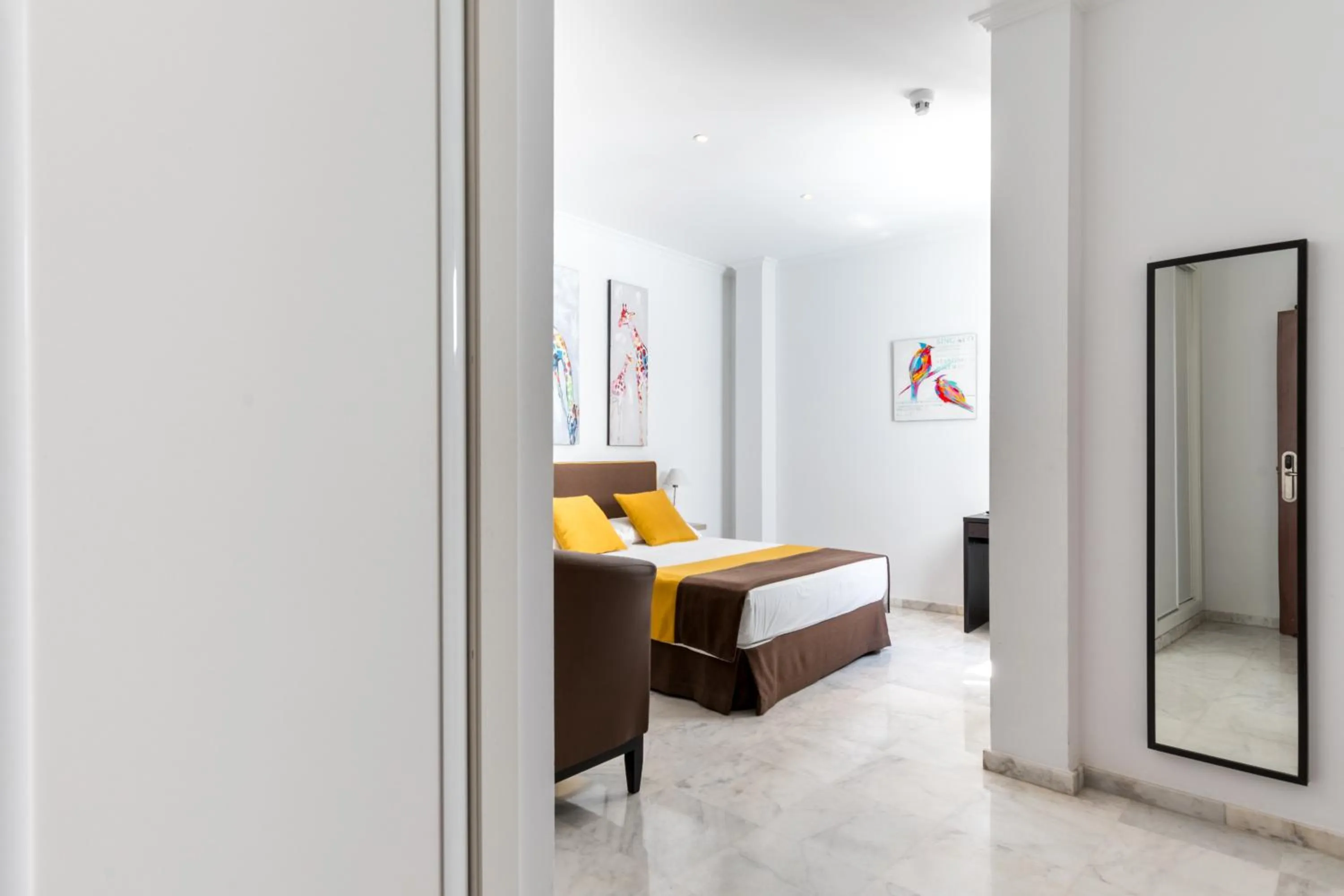 Bed in Cool Sevilla Hotel