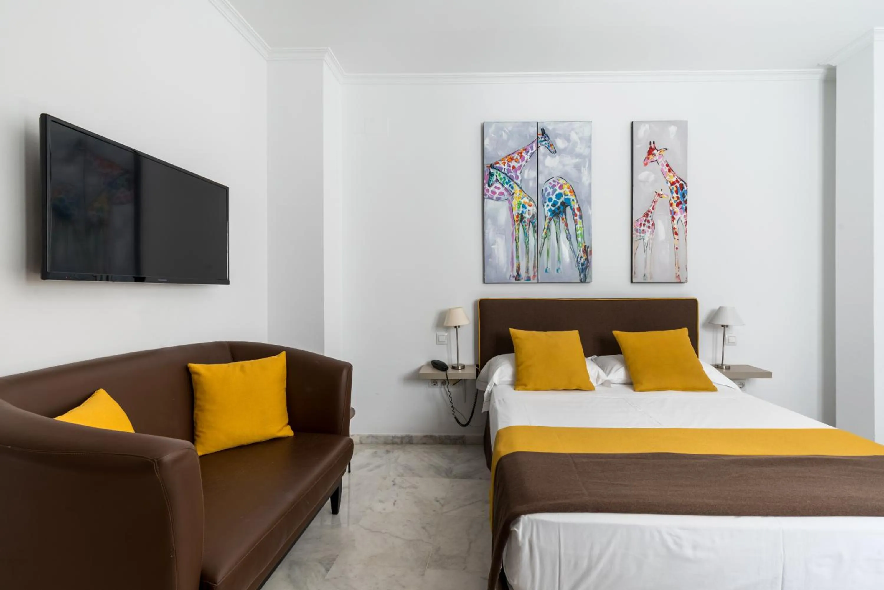 Bed in Cool Sevilla Hotel