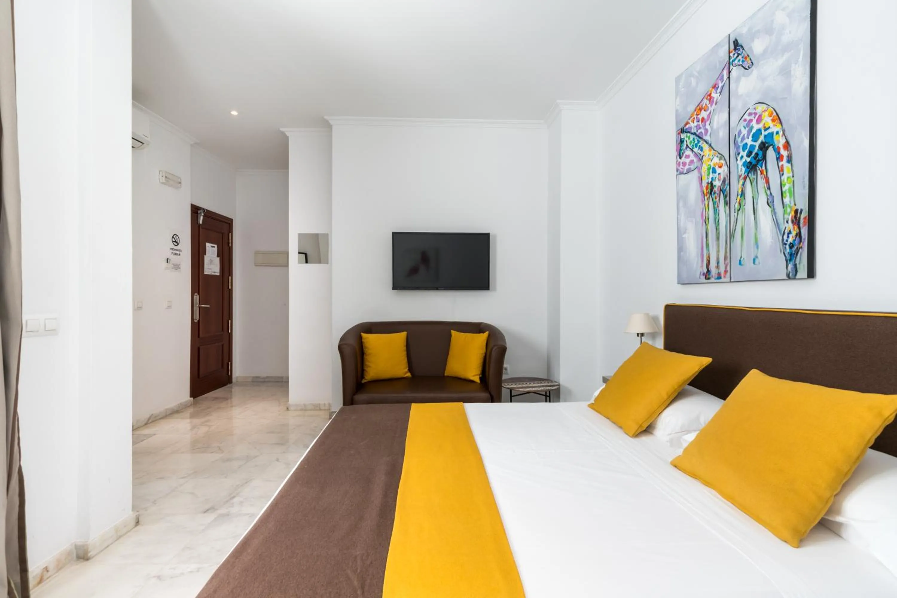 Bed in Cool Sevilla Hotel