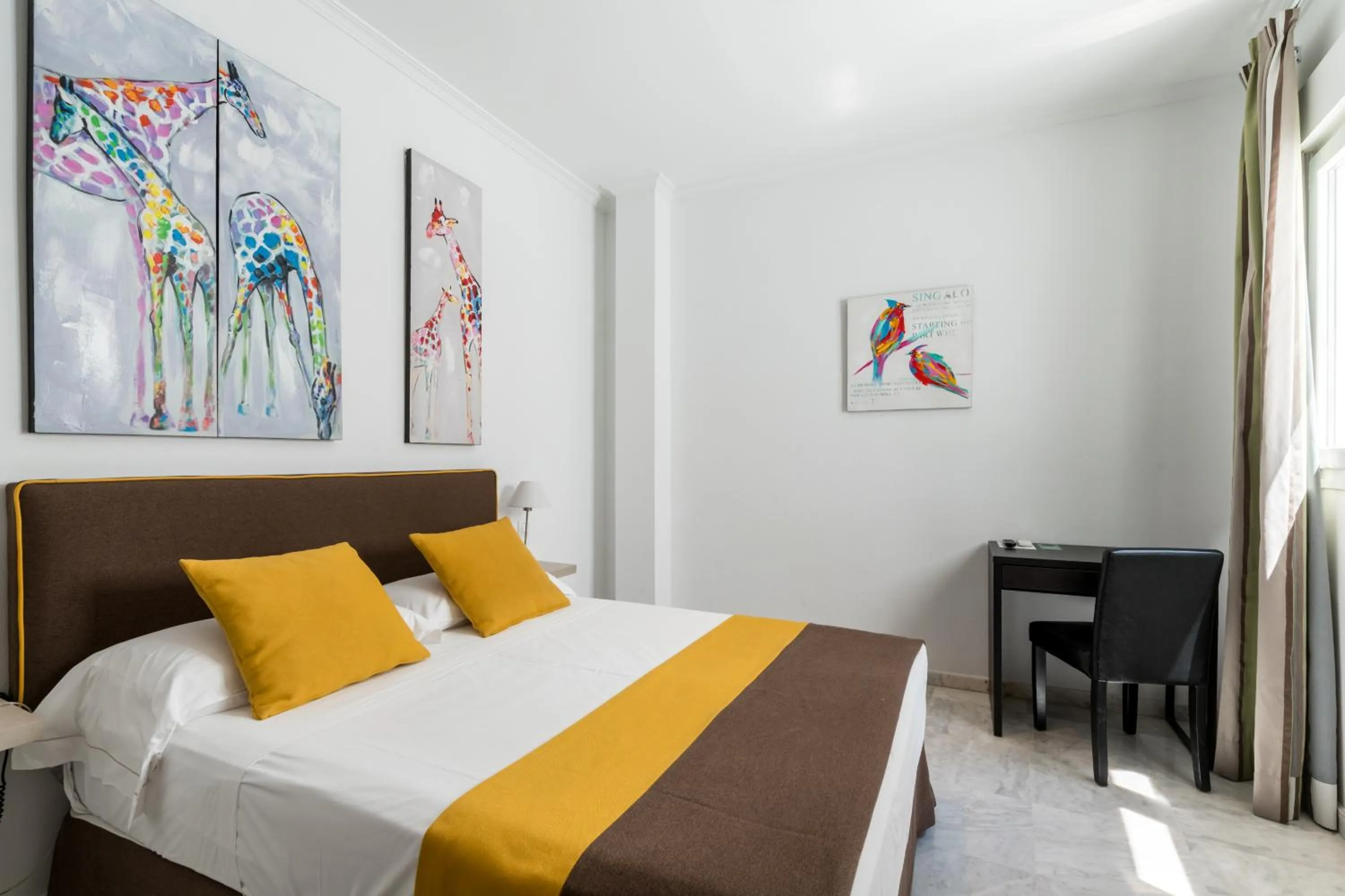 Bed in Cool Sevilla Hotel