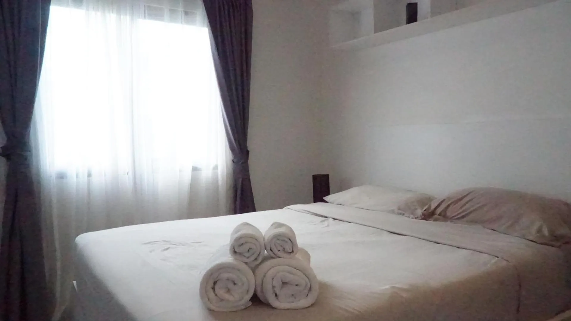 Bed in Island Escape 1BR T1-206