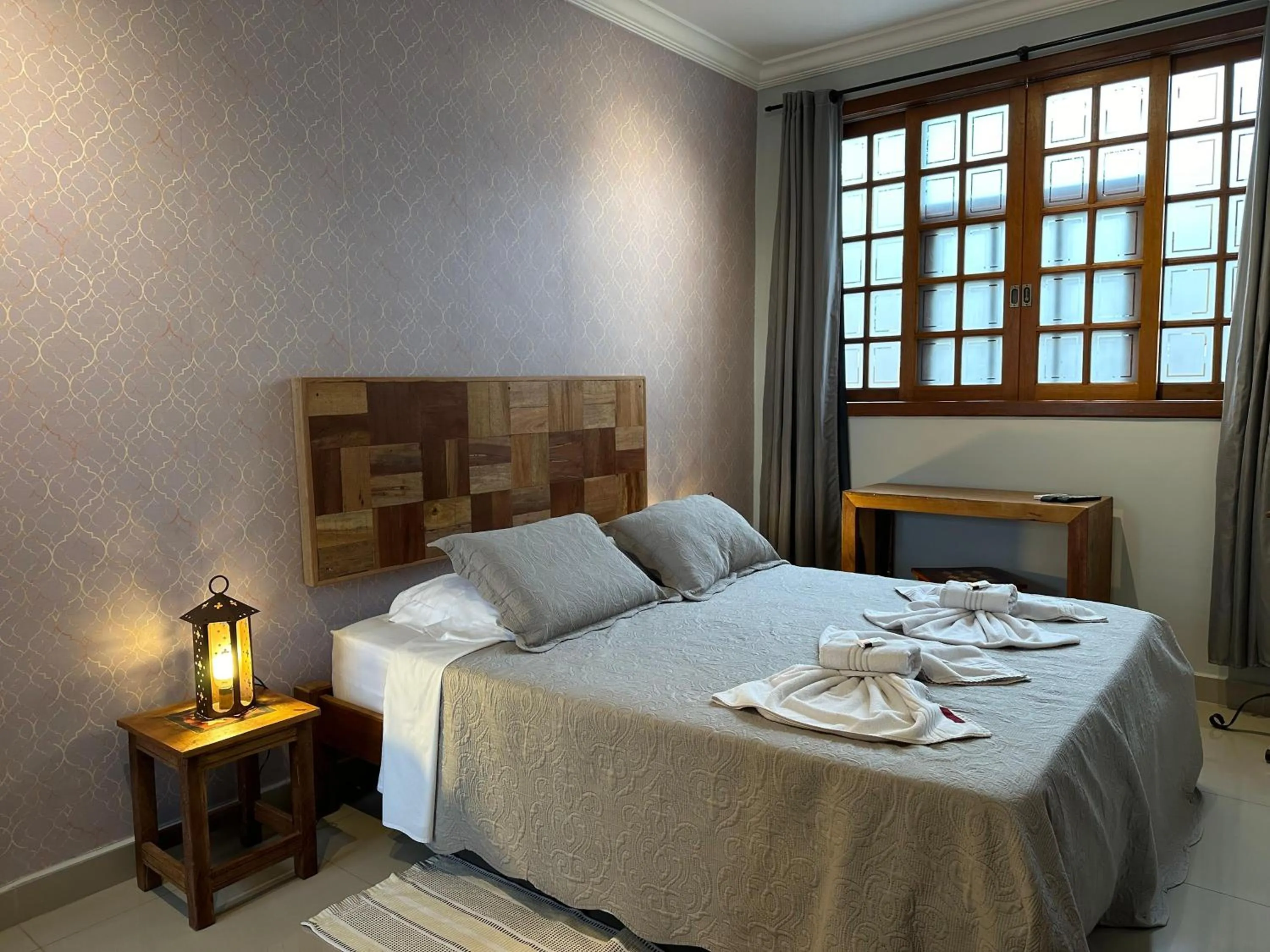 Bed in Pousada Maria Monteiro Tiradentes