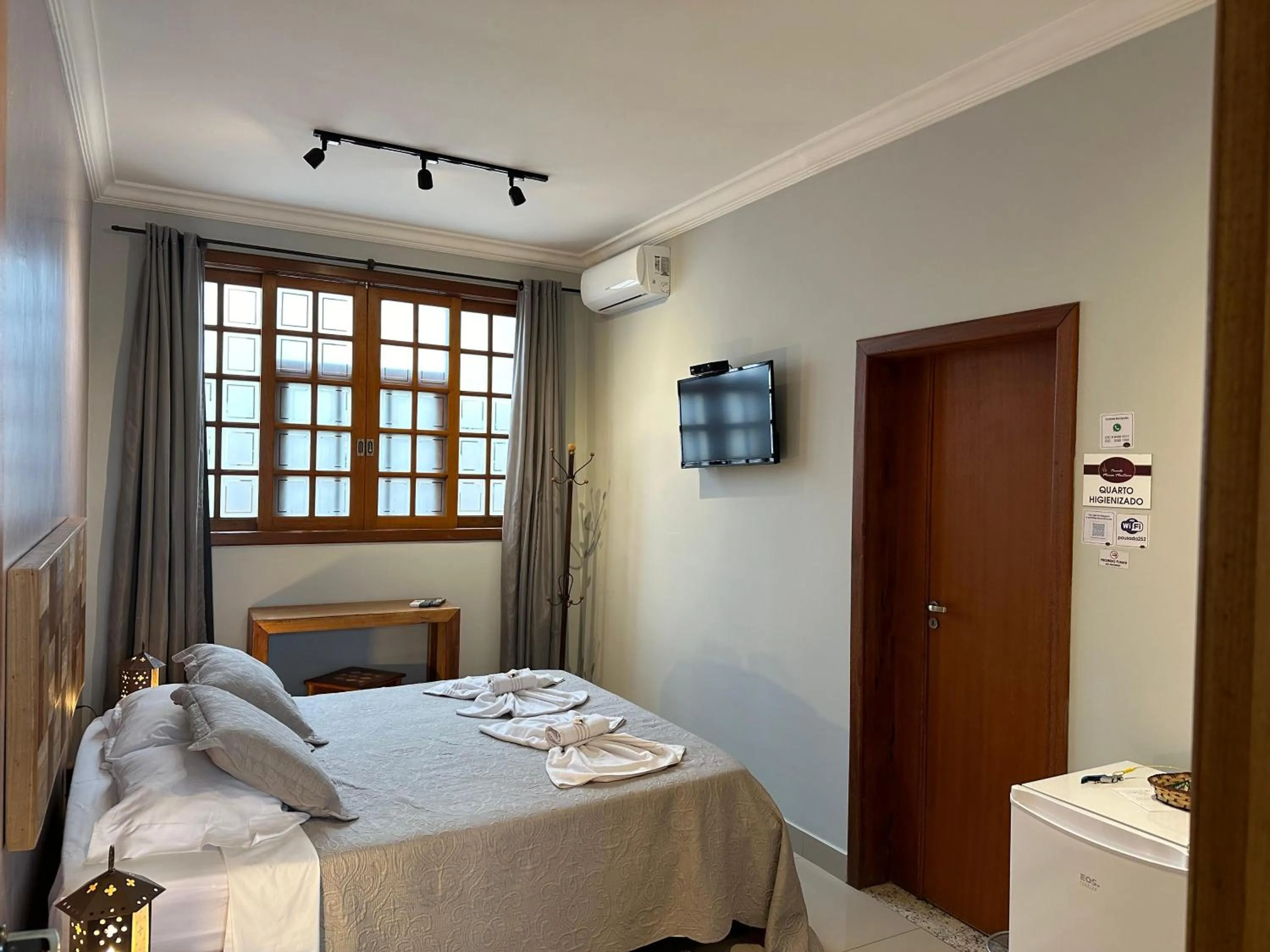 Bed in Pousada Maria Monteiro Tiradentes