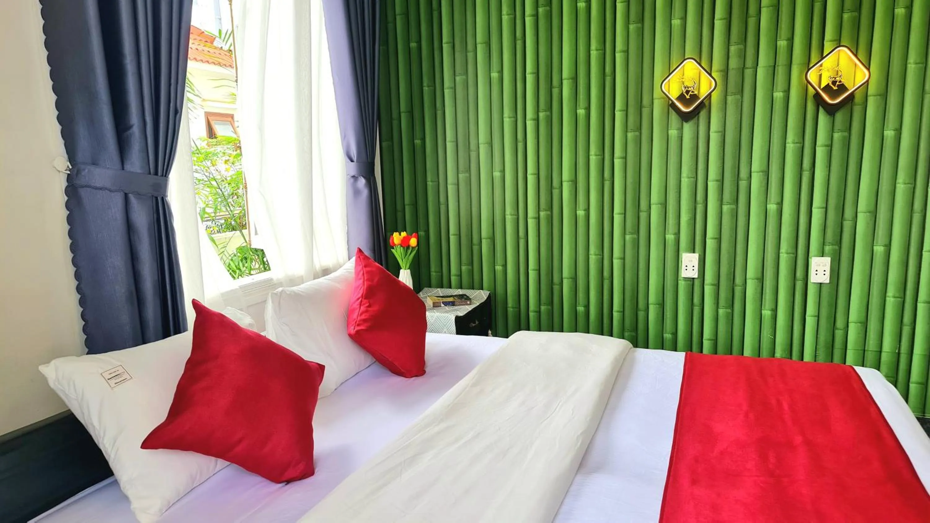 Bed in Minh Trang Villa Hoi An -BBQ Garden