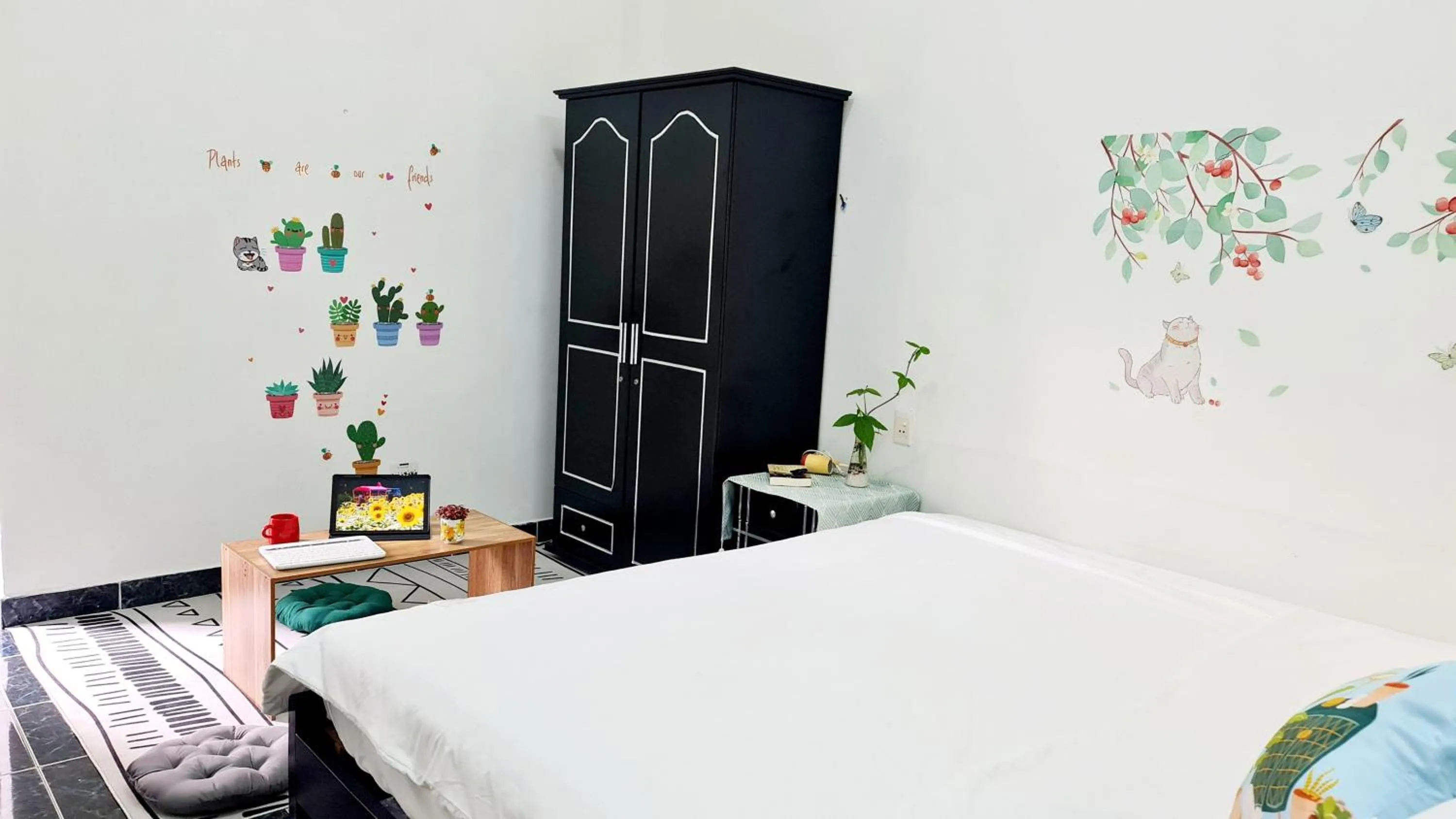 Bed in Minh Trang Villa Hoi An -BBQ Garden