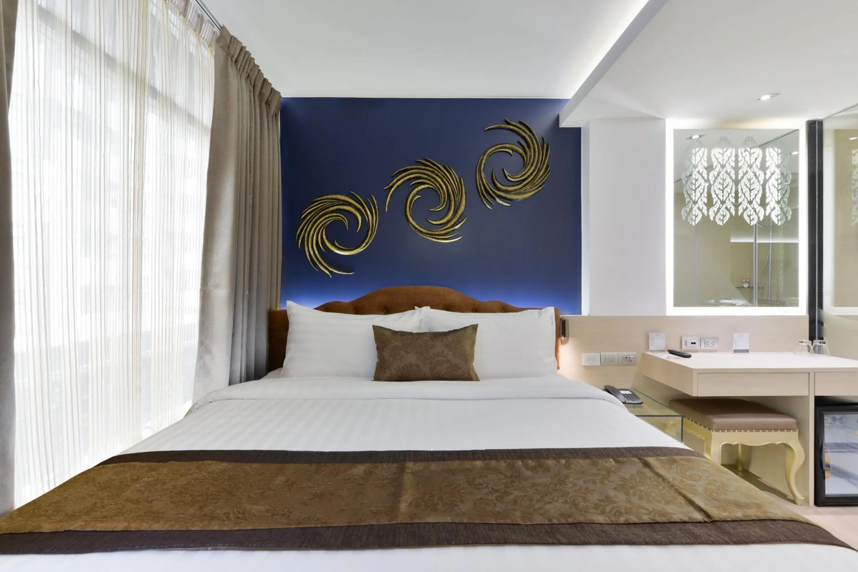 Bed in Syama Mansion Phromphong