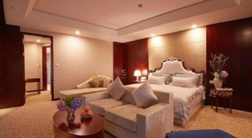 Bed in New Century Hotel Putuo Zhoushan