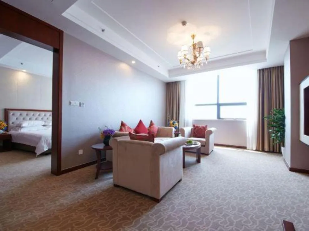Bed in New Century Hotel Putuo Zhoushan