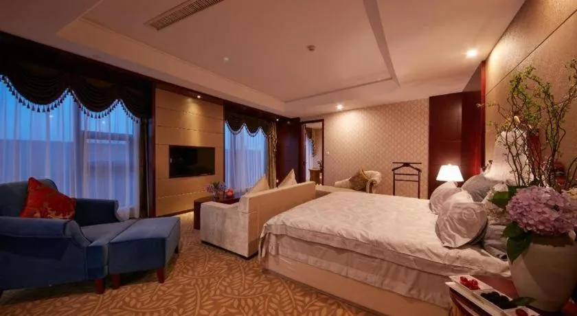 Bed in New Century Hotel Putuo Zhoushan
