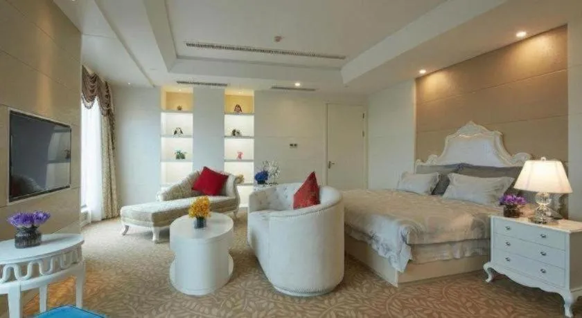 Bed in New Century Hotel Putuo Zhoushan