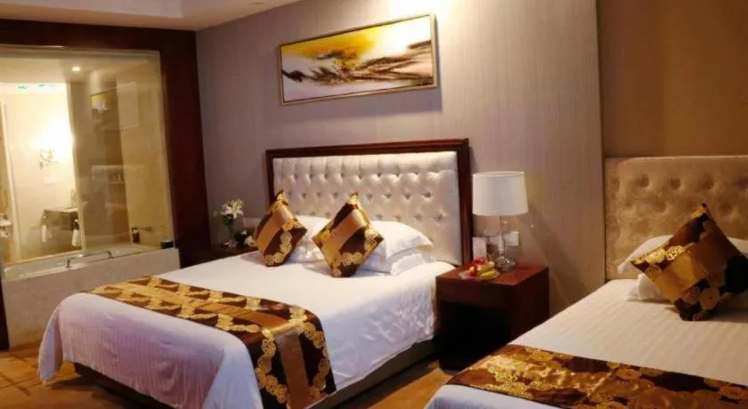 Bed in New Century Hotel Putuo Zhoushan