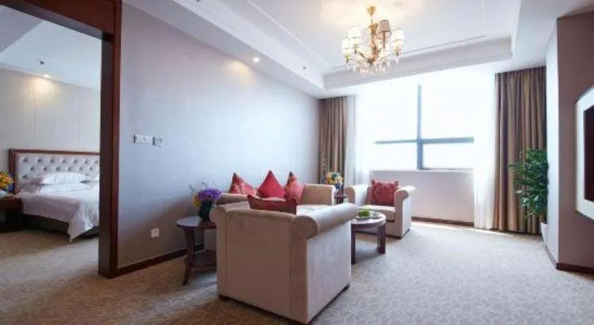 Bed in New Century Hotel Putuo Zhoushan