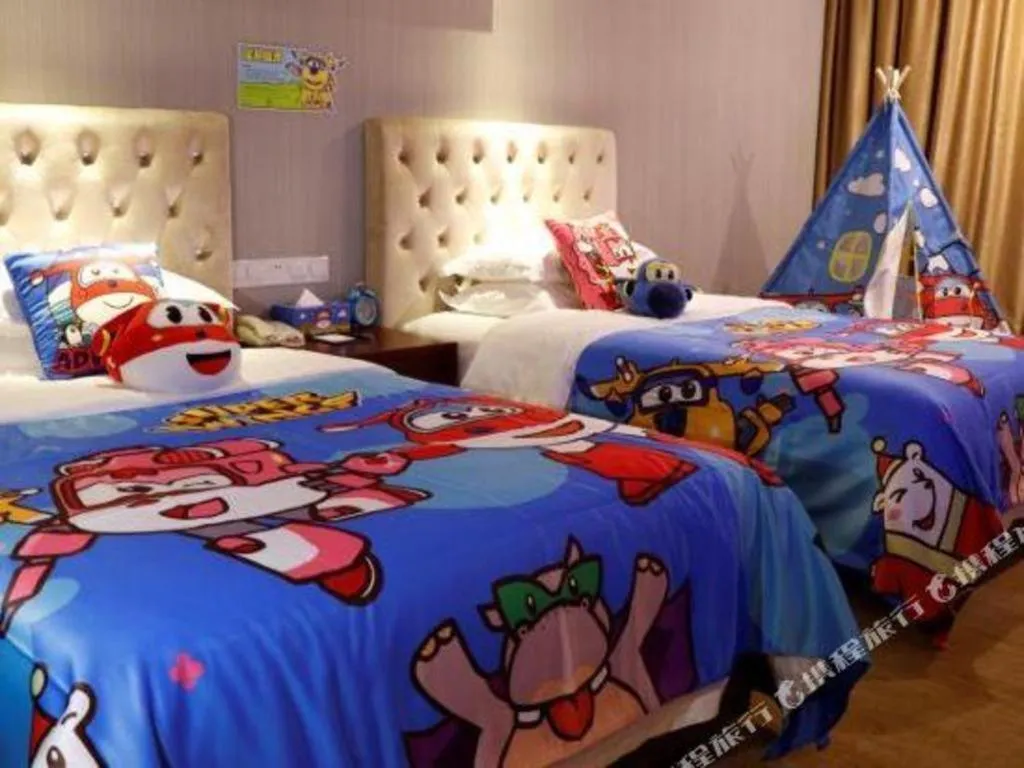 Bed in New Century Hotel Putuo Zhoushan