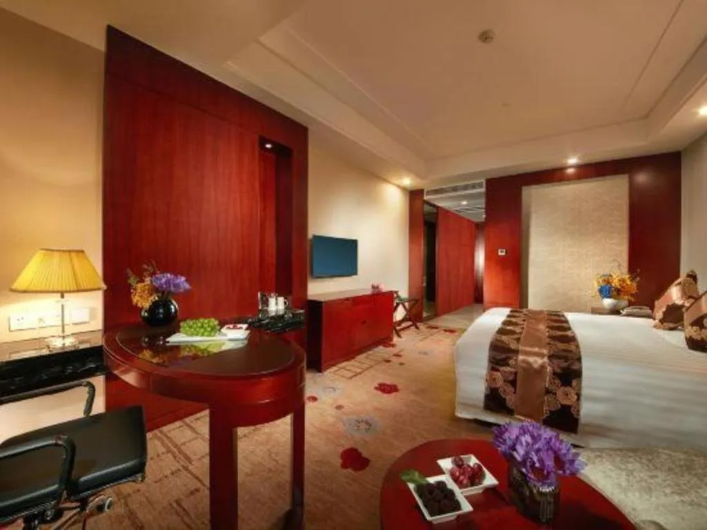 Bed in New Century Hotel Putuo Zhoushan