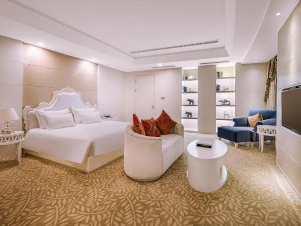 Bed in New Century Hotel Putuo Zhoushan