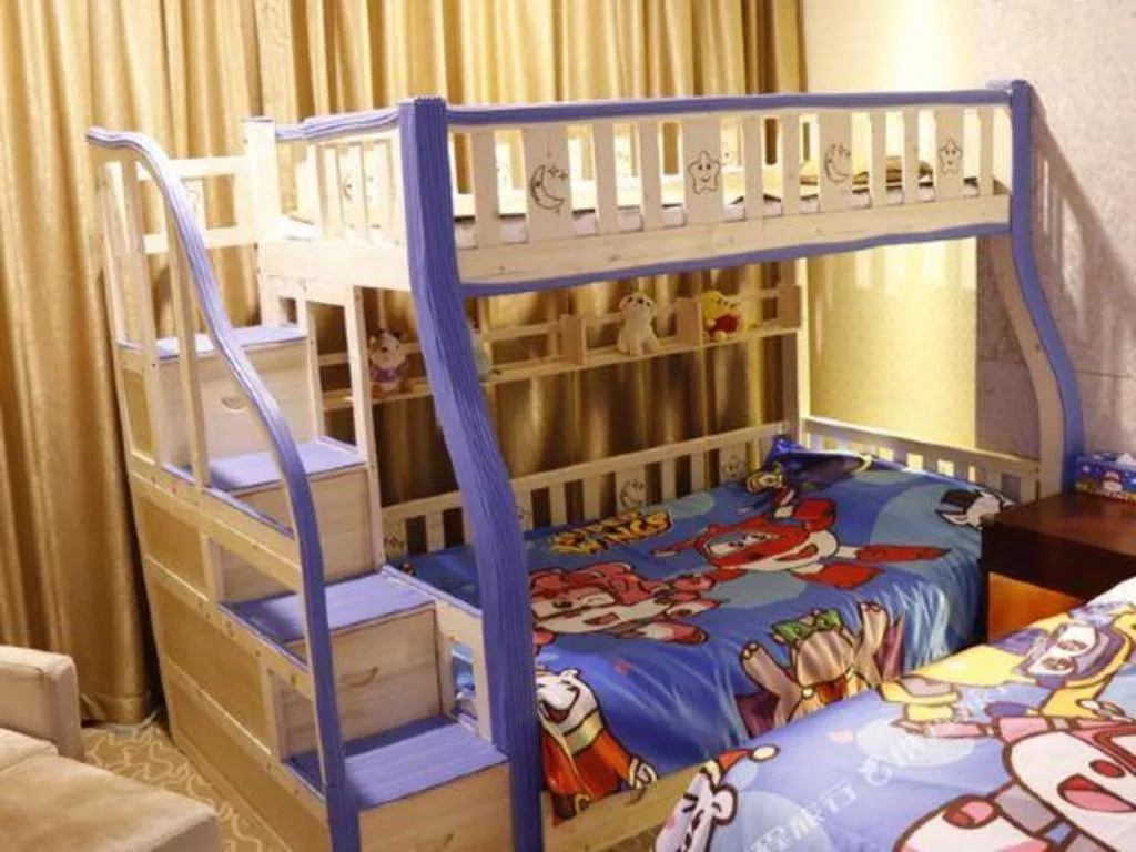 Bed in New Century Hotel Putuo Zhoushan