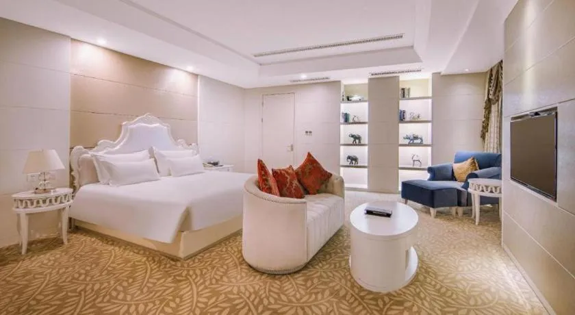 Bed in New Century Hotel Putuo Zhoushan