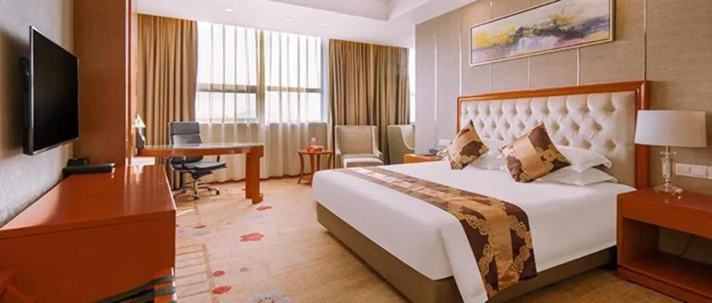 Bed in New Century Hotel Putuo Zhoushan