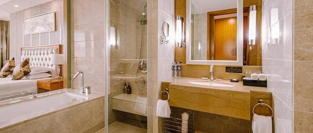 Bed in New Century Hotel Putuo Zhoushan