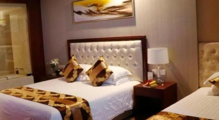 Bed in New Century Hotel Putuo Zhoushan