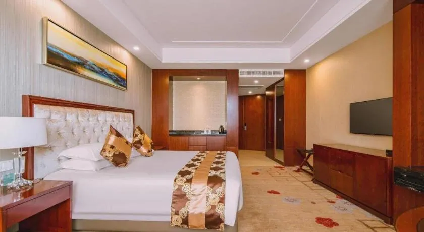 Bed in New Century Hotel Putuo Zhoushan