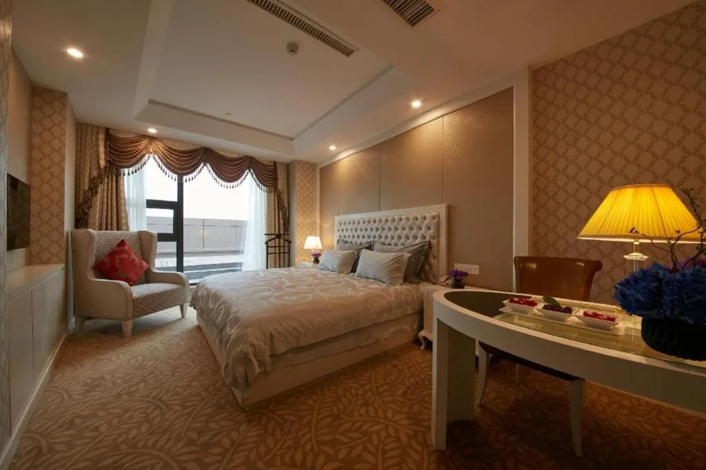 Bed in New Century Hotel Putuo Zhoushan