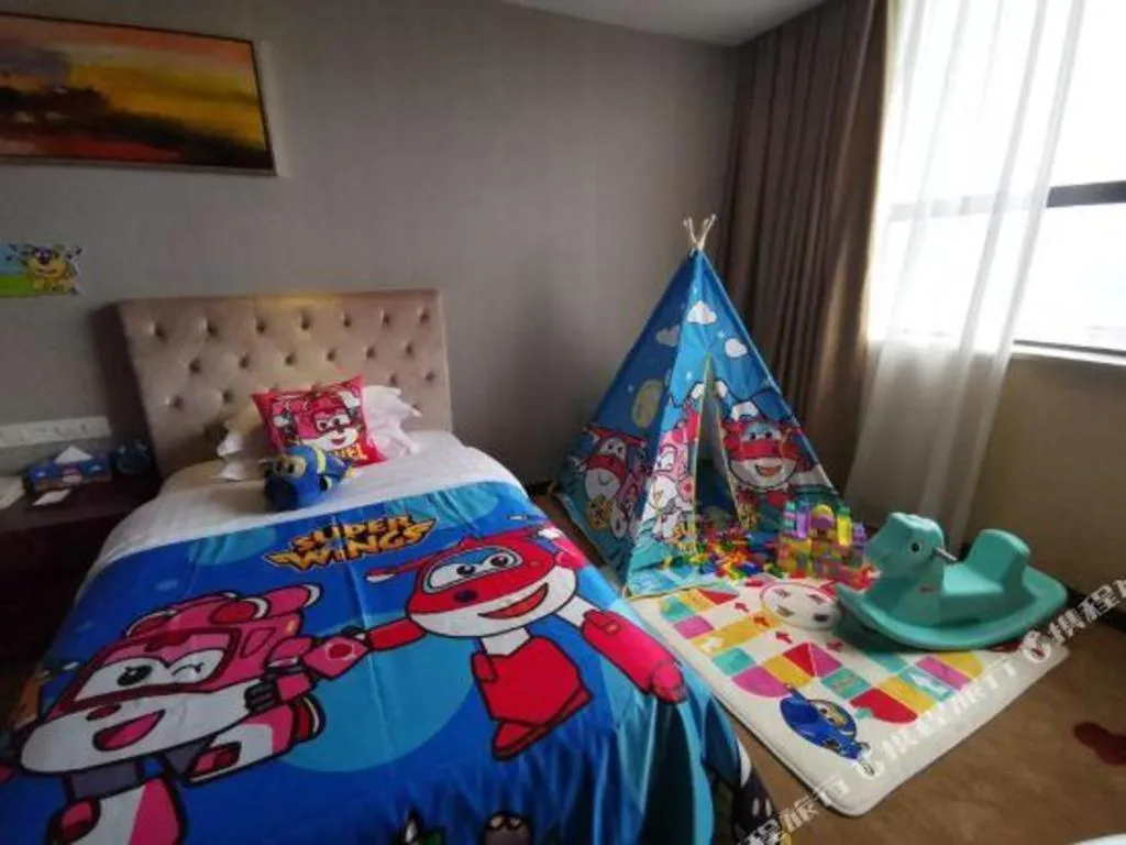 Bed in New Century Hotel Putuo Zhoushan