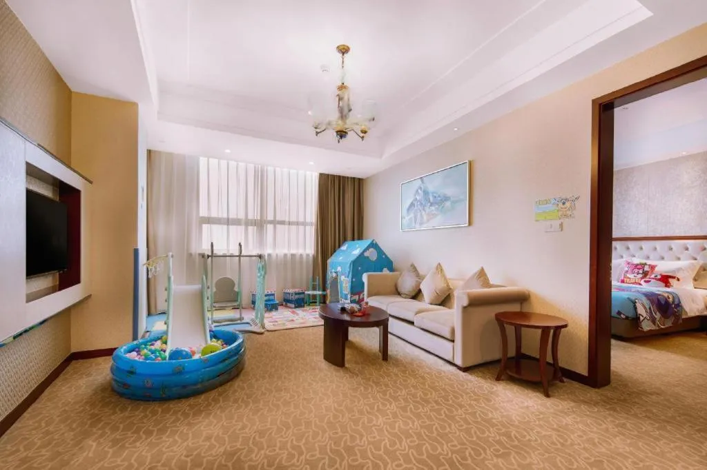 Bed in New Century Hotel Putuo Zhoushan