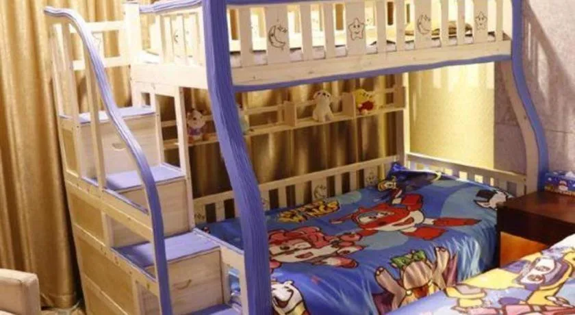 Bed in New Century Hotel Putuo Zhoushan